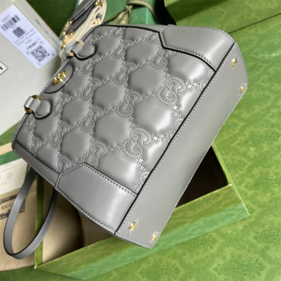 GG matelassé mini top handle bag
