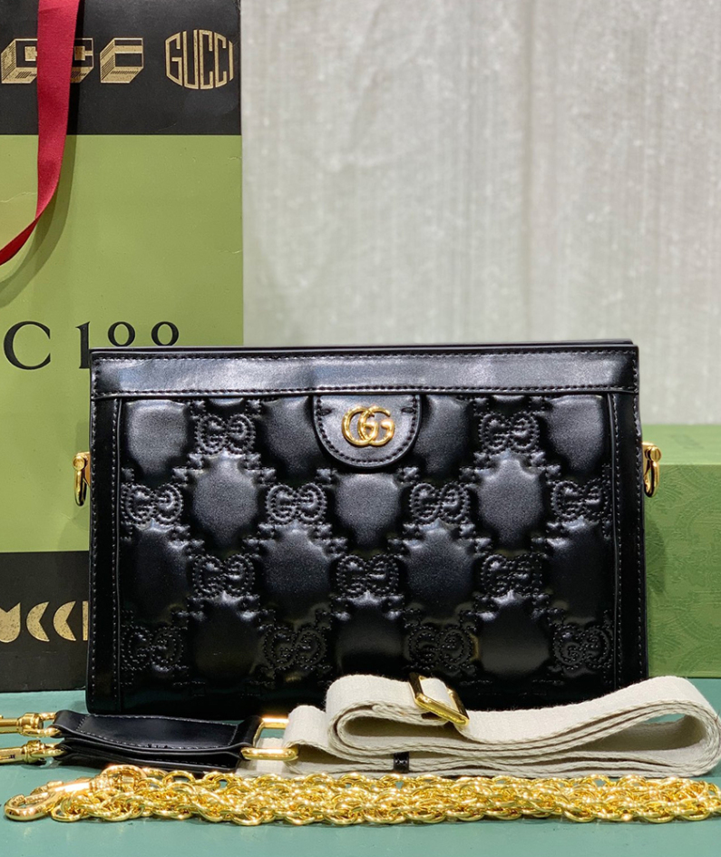 GG Matelassé leather small bag