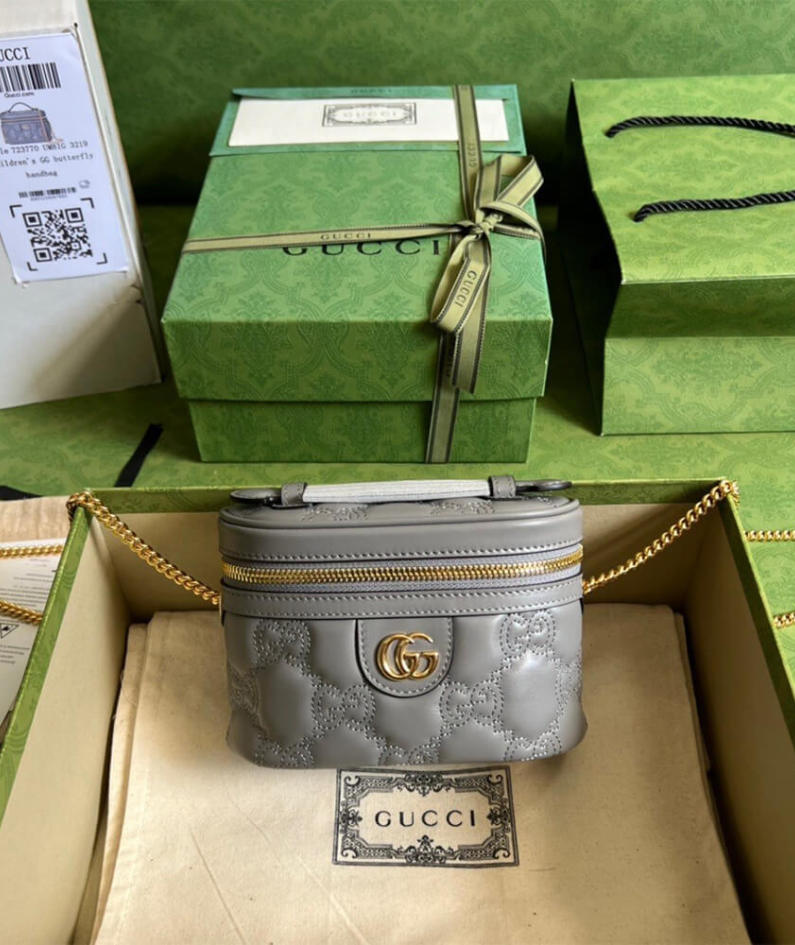 GG Matelassé top handle mini bag