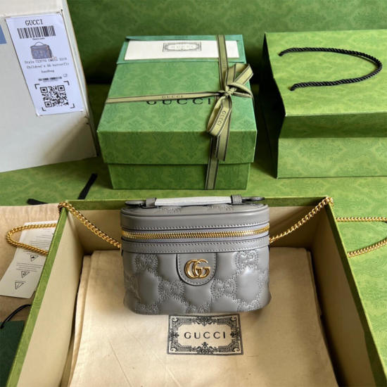 GG Matelassé top handle mini bag