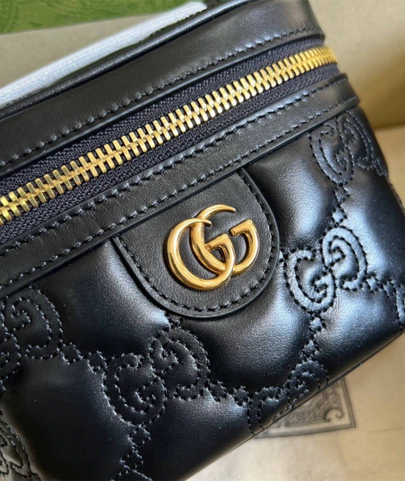 GG Matelassé top handle mini bag