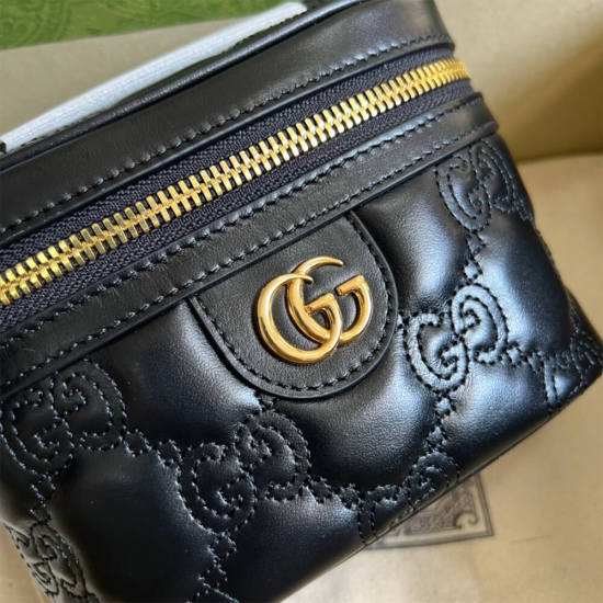GG Matelassé top handle mini bag