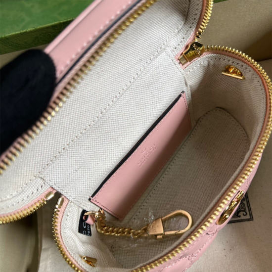 GG Matelassé top handle mini bag