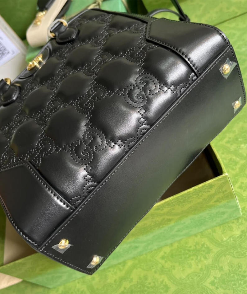 GG matelassé mini top handle bag