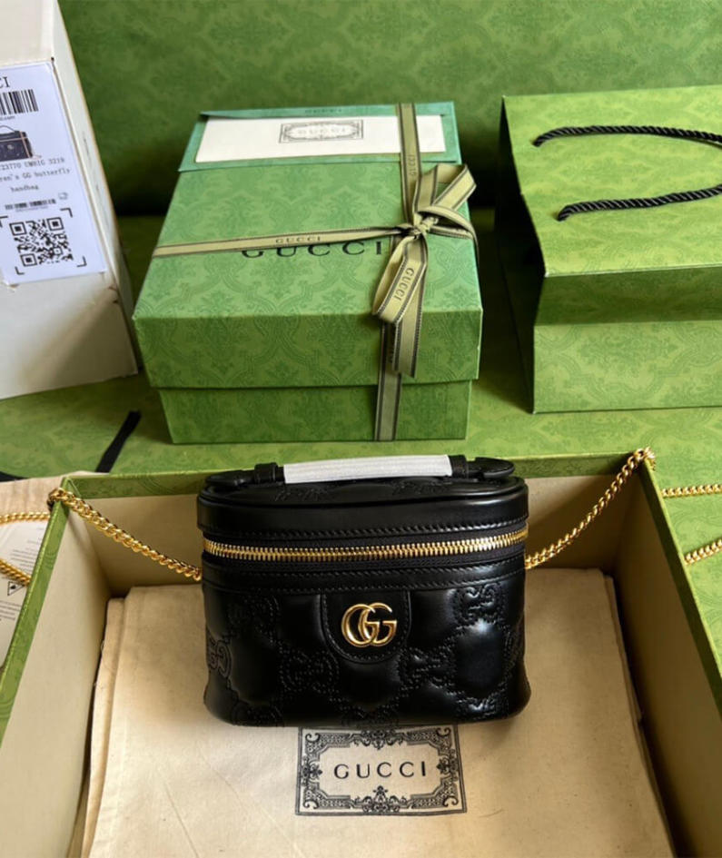 GG Matelassé top handle mini bag