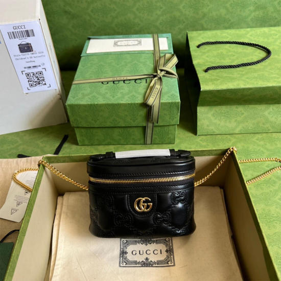 GG Matelassé top handle mini bag