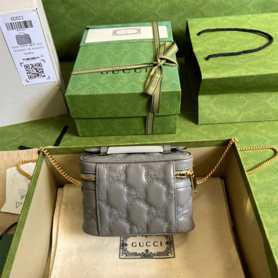 GG Matelassé top handle mini bag