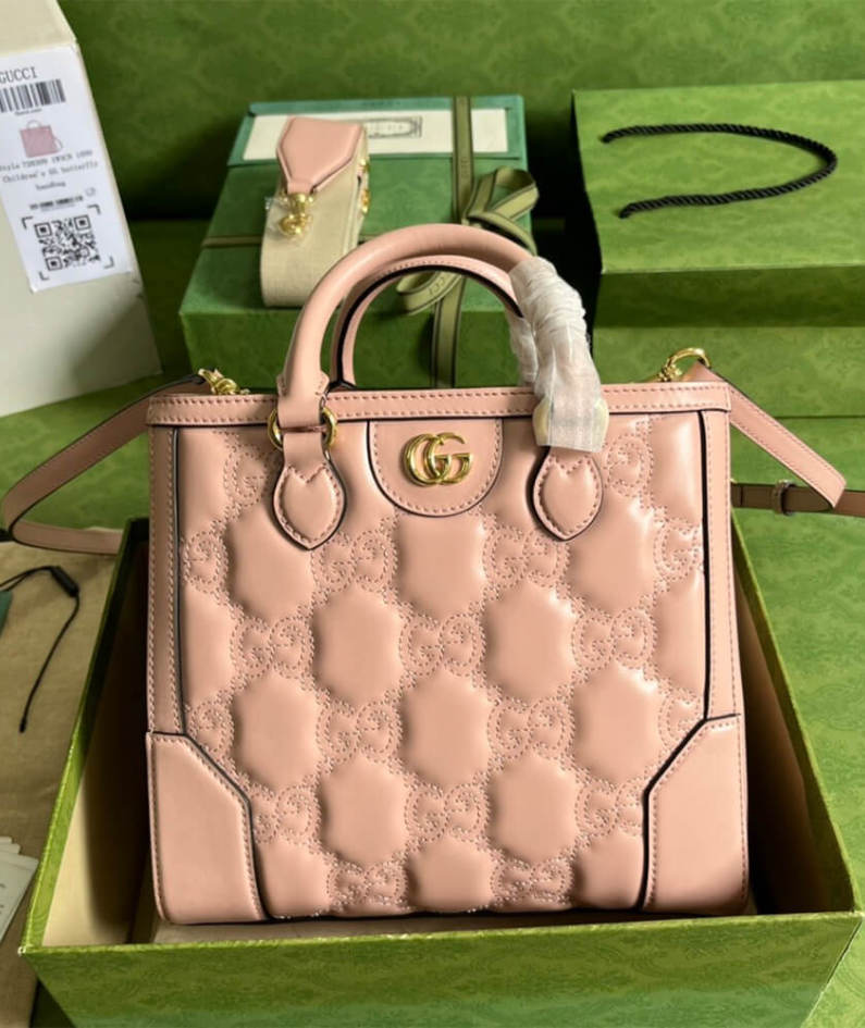 GG matelassé mini top handle bag