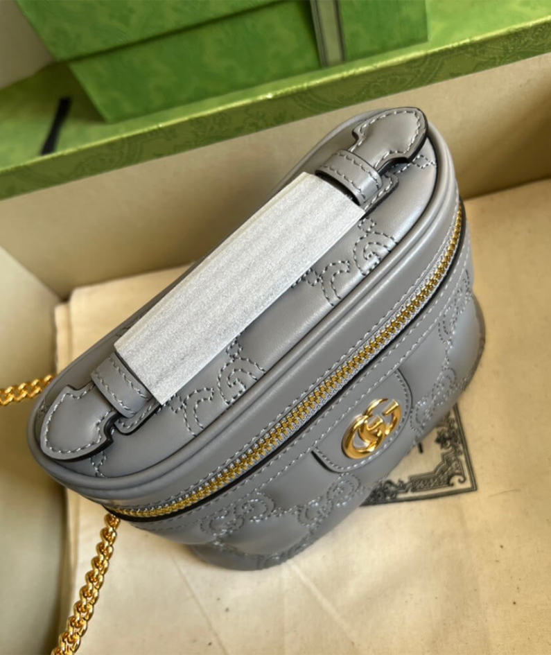 GG Matelassé top handle mini bag