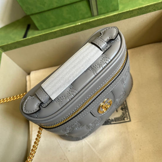 GG Matelassé top handle mini bag