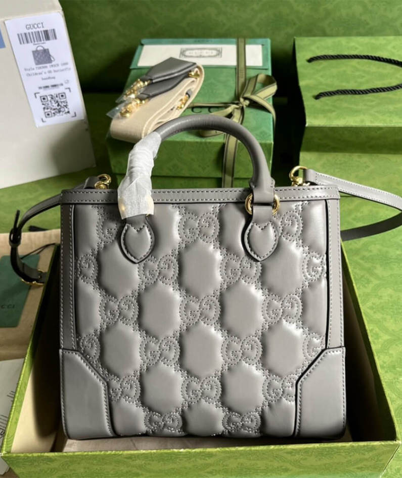 GG matelassé mini top handle bag