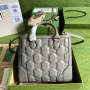 GG matelassé mini top handle bag