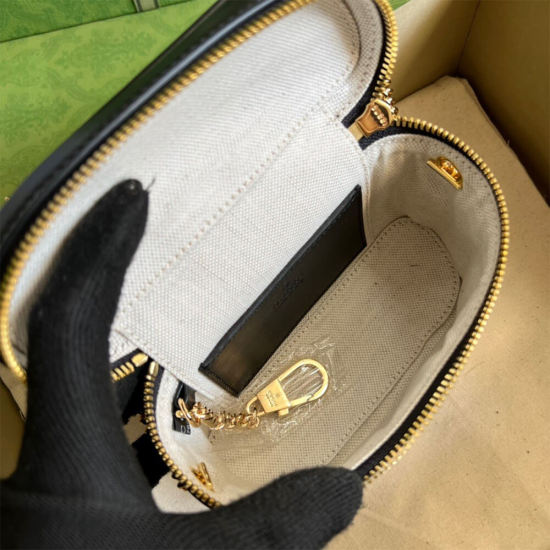 GG Matelassé top handle mini bag