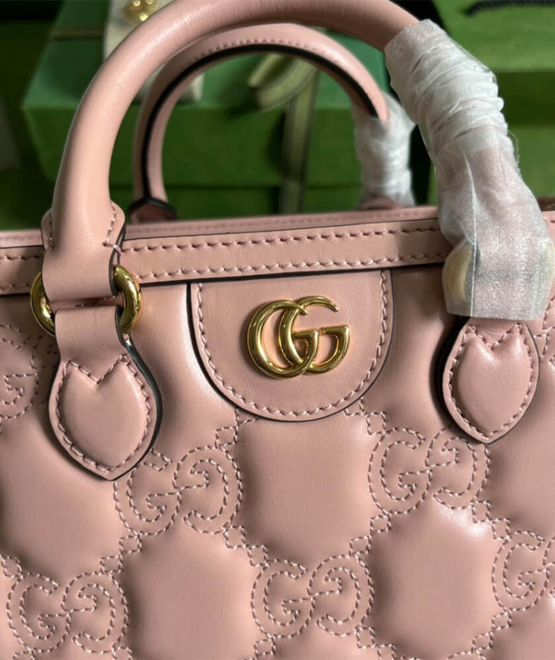 GG matelassé mini top handle bag