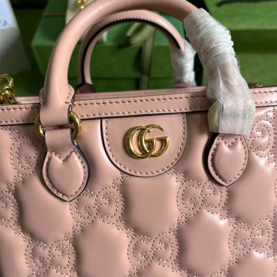 GG matelassé mini top handle bag