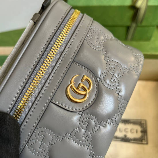 GG Matelassé top handle mini bag