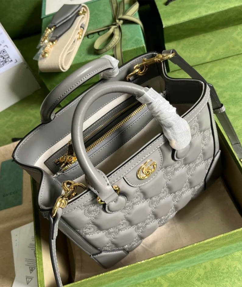 GG matelassé mini top handle bag