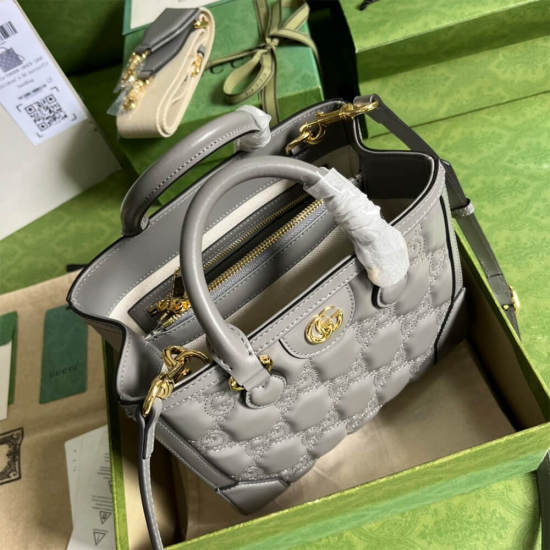 GG matelassé mini top handle bag