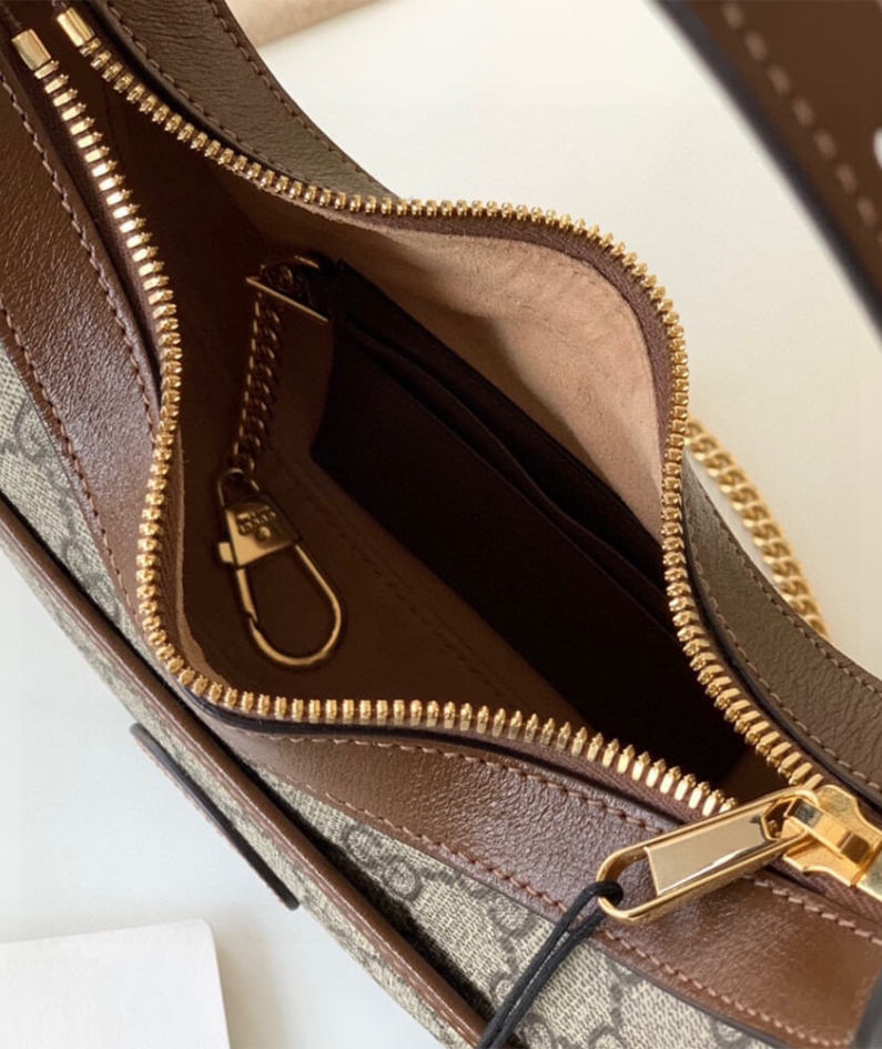 GG half-moon-shaped mini bag