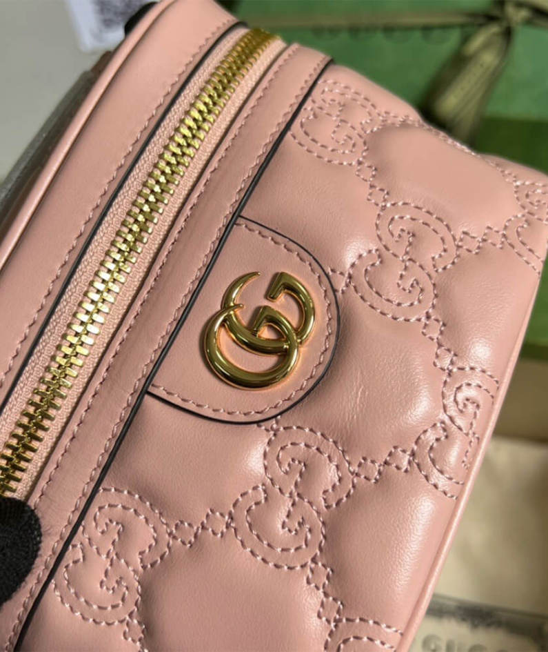 GG Matelassé top handle mini bag