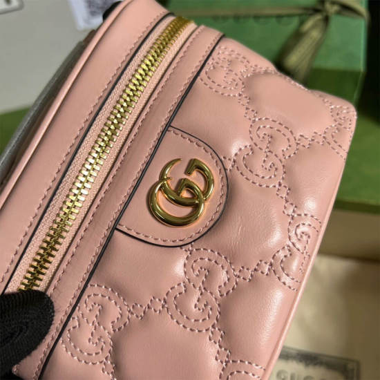 GG Matelassé top handle mini bag