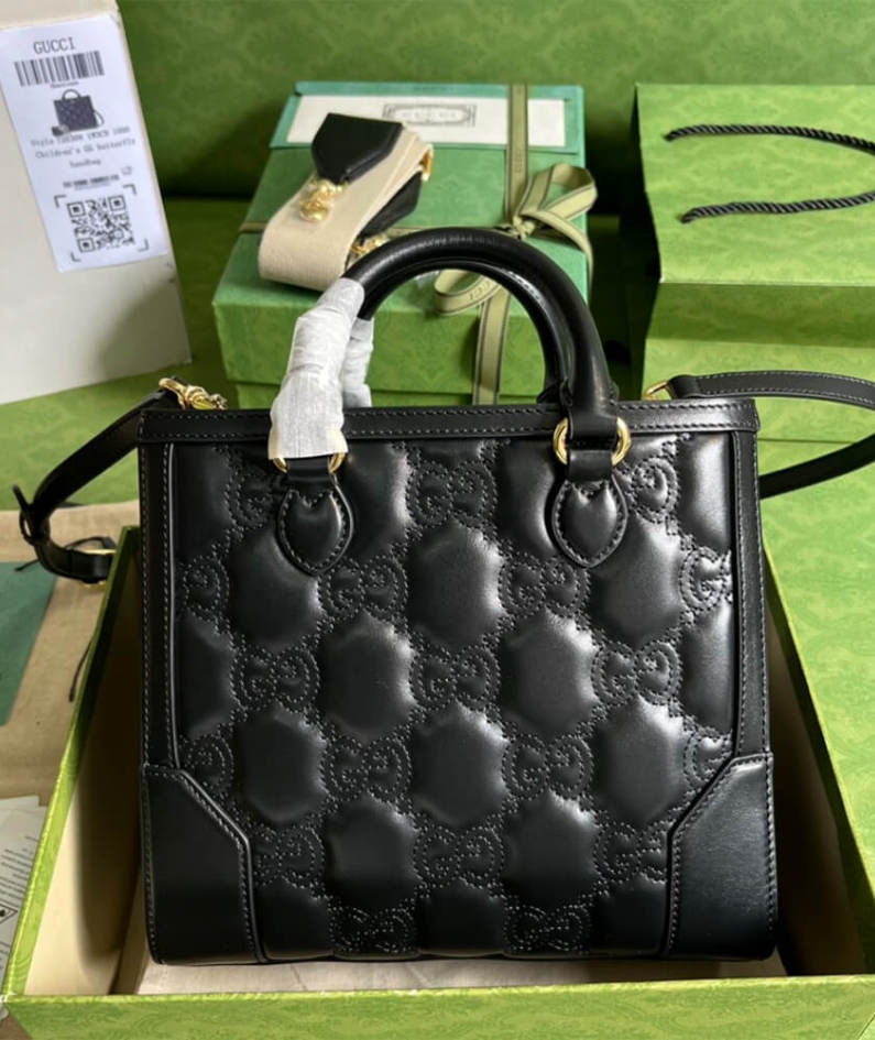 GG matelassé mini top handle bag