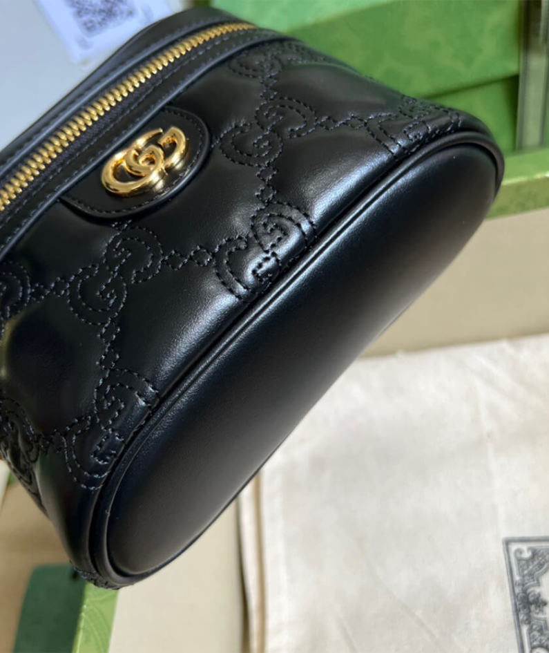 GG Matelassé top handle mini bag