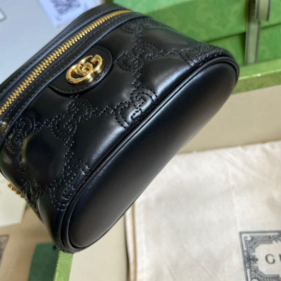 GG Matelassé top handle mini bag