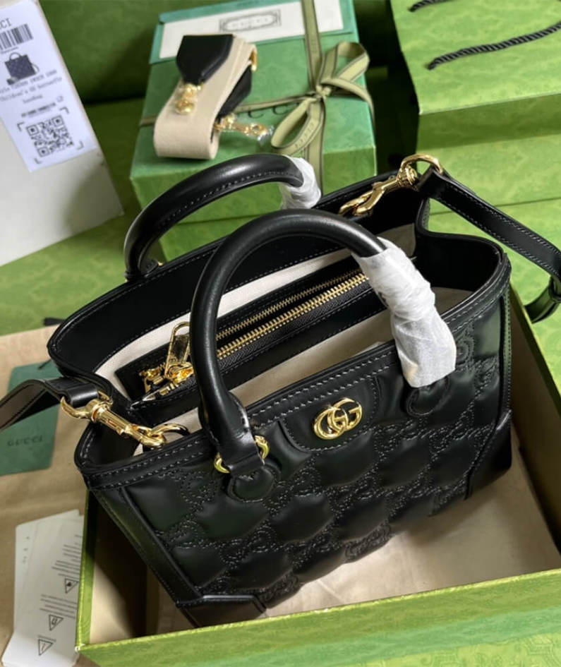 GG matelassé mini top handle bag