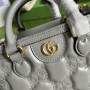GG matelassé mini top handle bag