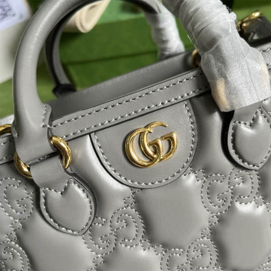 GG matelassé mini top handle bag