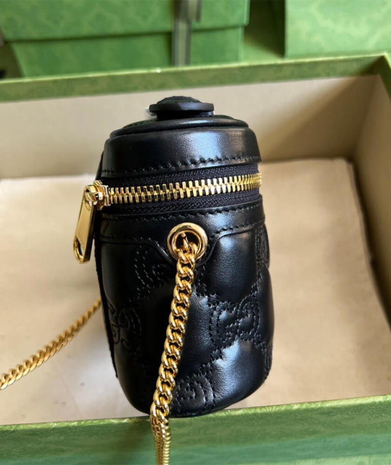 GG Matelassé top handle mini bag