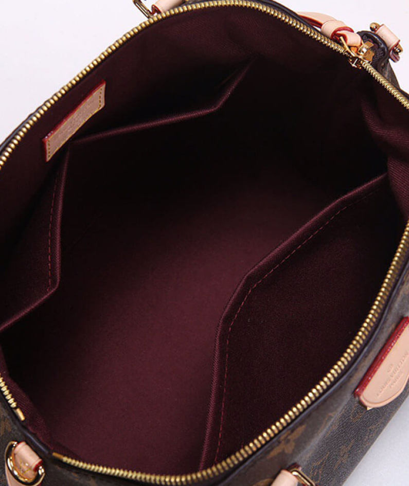 LV Rivoli MM Handbag