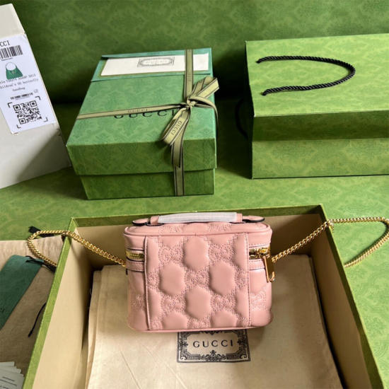 GG Matelassé top handle mini bag