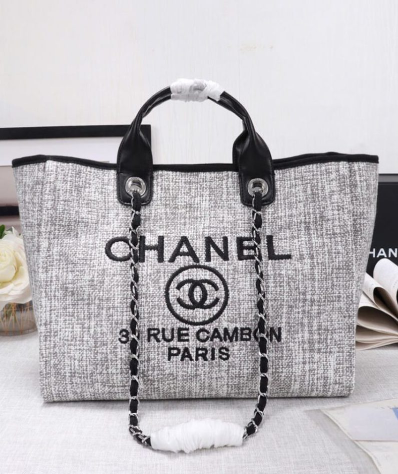 CHANEL Woven Straw Raffia Striped Medium Deauville Tote CHANEL Woven Straw Raffia Striped Medium Deauville Tote