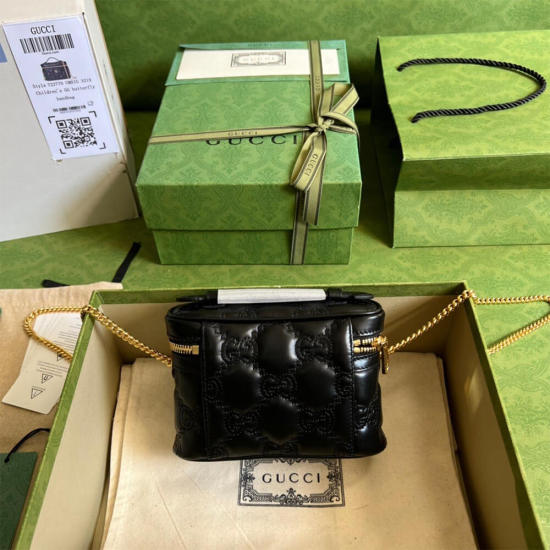 GG Matelassé top handle mini bag
