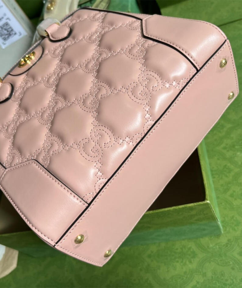 GG matelassé mini top handle bag