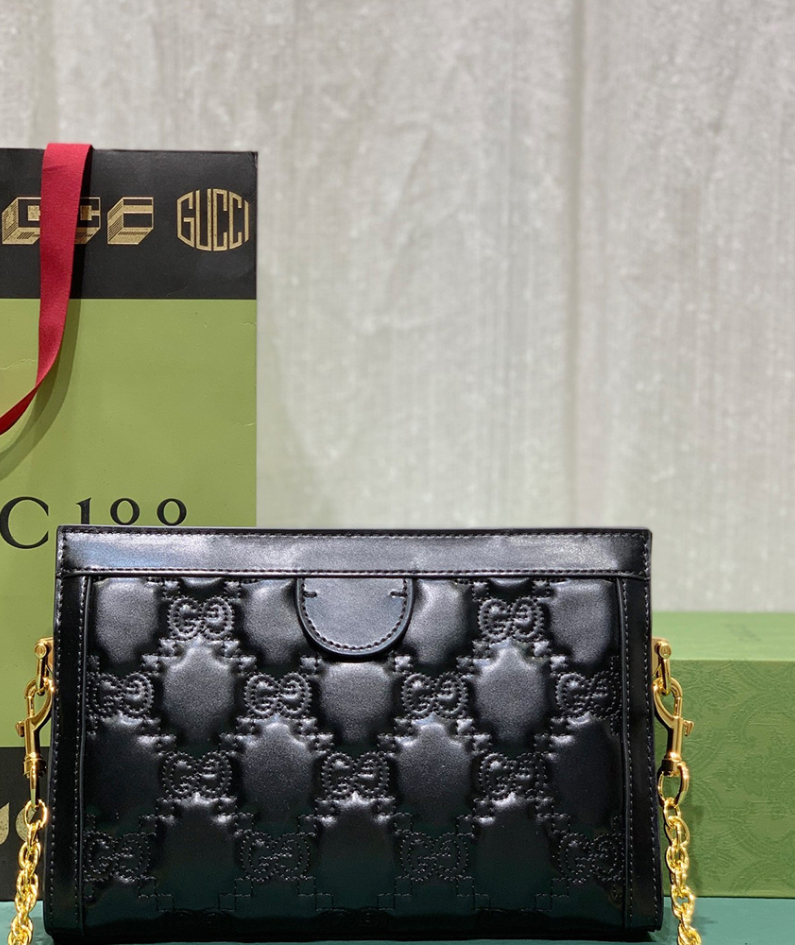GG Matelassé leather small bag