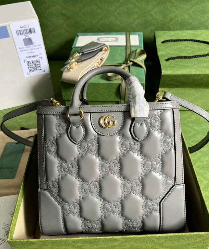 GG matelassé mini top handle bag