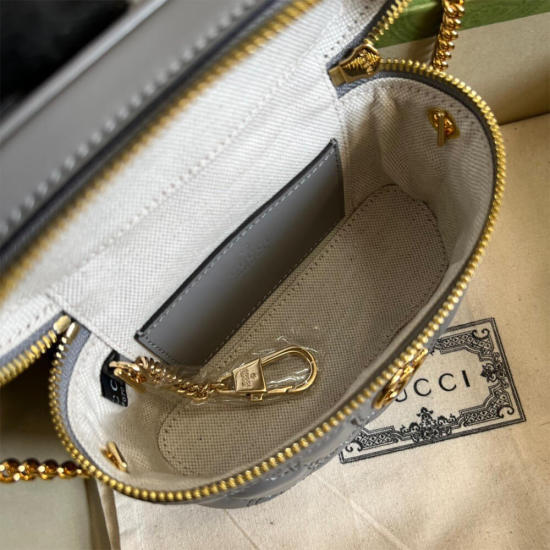 GG Matelassé top handle mini bag
