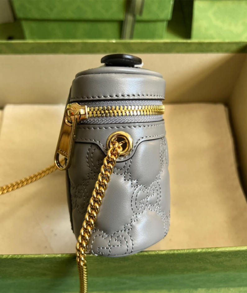GG Matelassé top handle mini bag