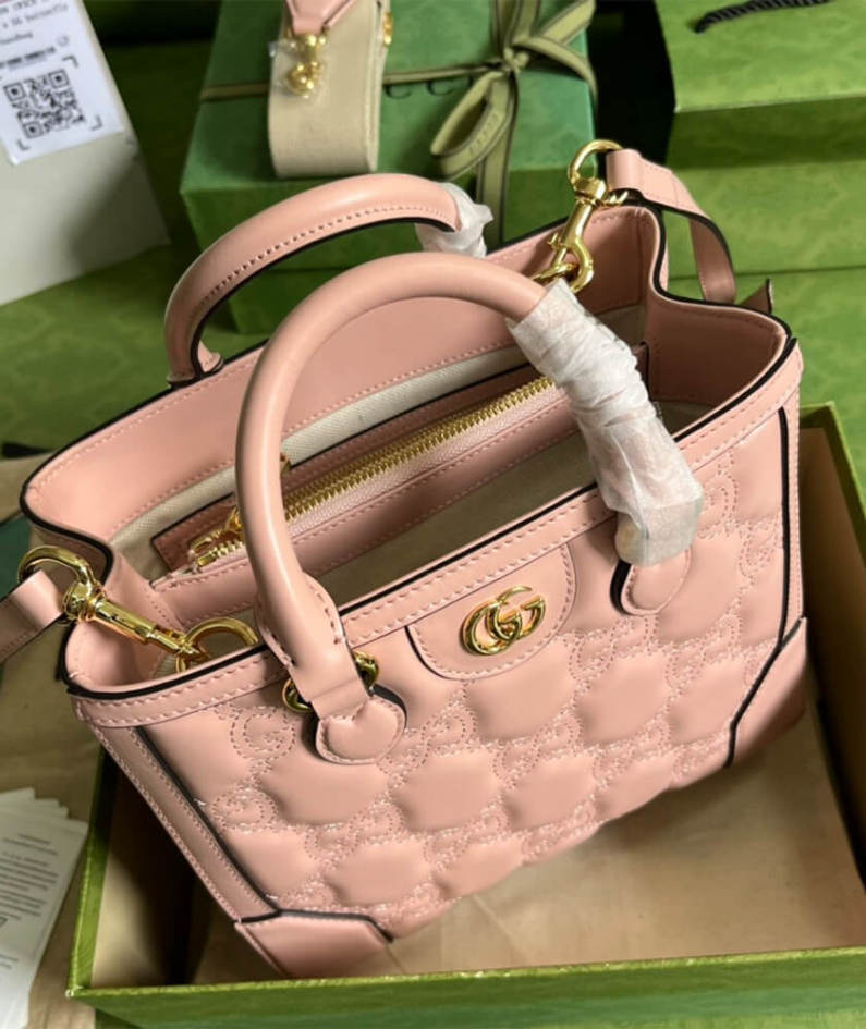 GG matelassé mini top handle bag