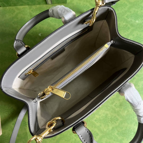 GG matelassé mini top handle bag