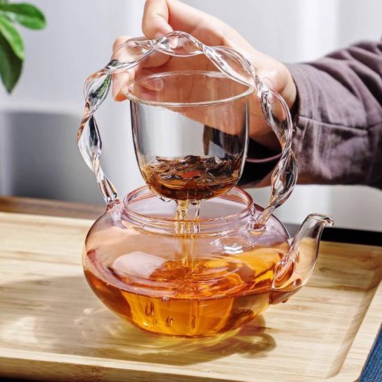 Glass teapot | tea water separation handle pot | creative pink butterfly button flower teapot | high temperature resistant teapot Glass teapot | tea water separation handle pot | creative pink butterfly button flower teapot | high temperature resistant teapot
