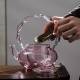Glass teapot | tea water separation handle pot | creative pink butterfly button flower teapot | high temperature resistant teapot