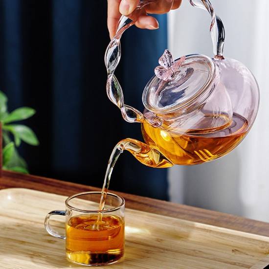 Glass teapot | tea water separation handle pot | creative pink butterfly button flower teapot | high temperature resistant teapot Glass teapot | tea water separation handle pot | creative pink butterfly button flower teapot | high temperature resistant teapot