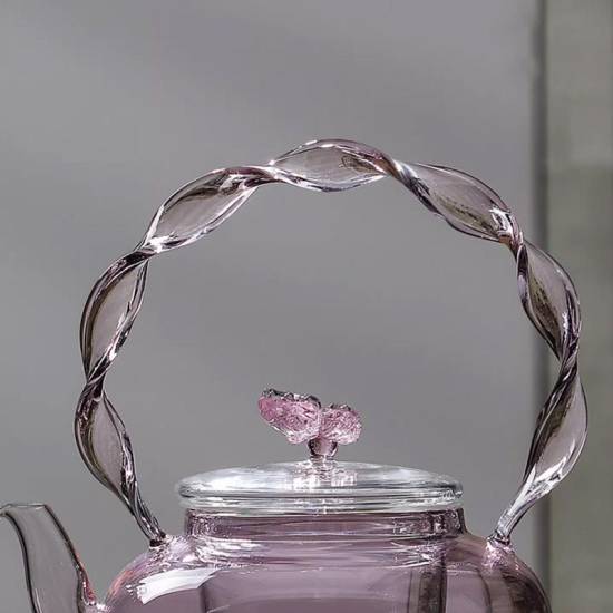 Glass teapot | tea water separation handle pot | creative pink butterfly button flower teapot | high temperature resistant teapot Glass teapot | tea water separation handle pot | creative pink butterfly button flower teapot | high temperature resistant teapot